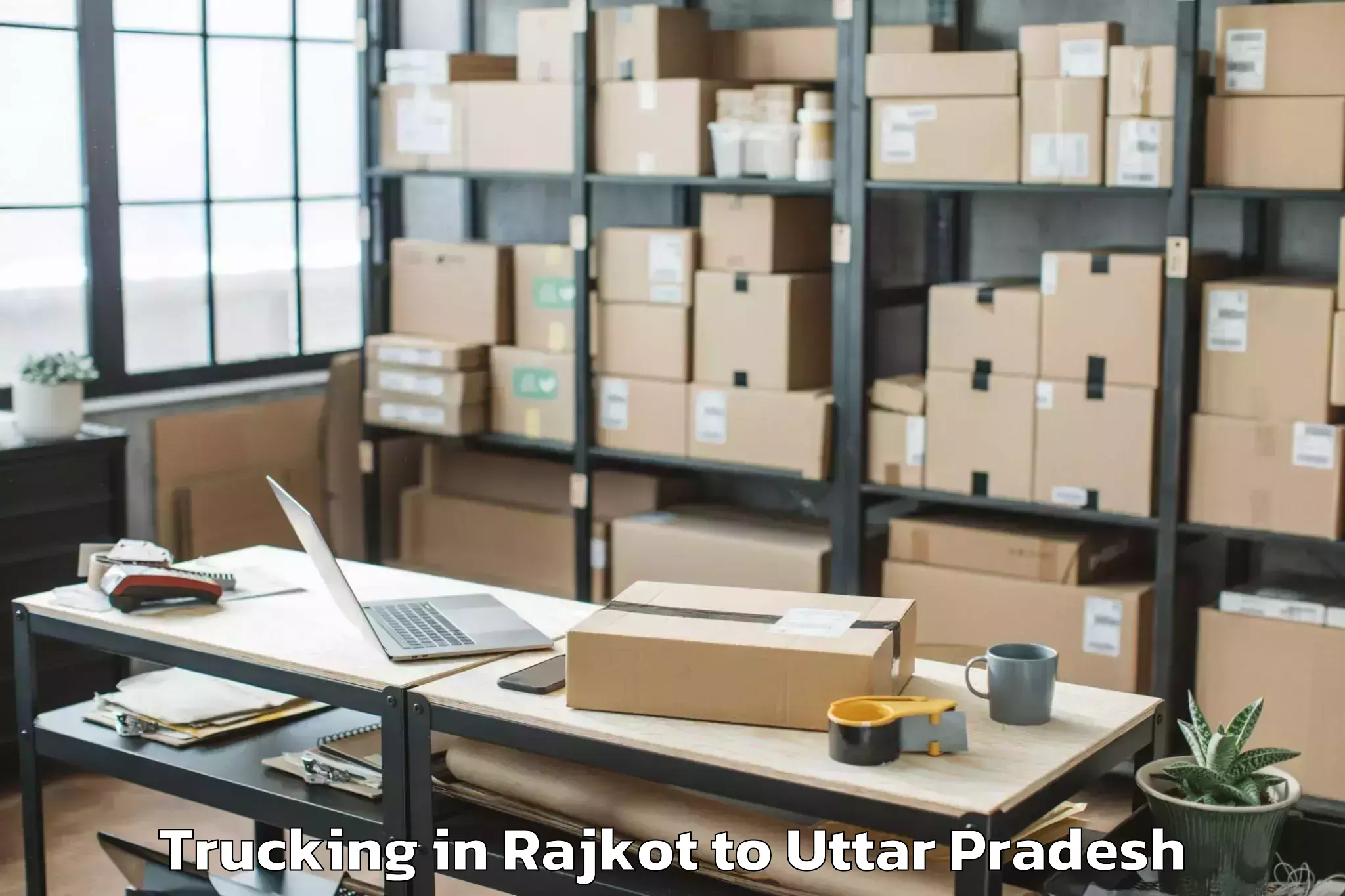 Quality Rajkot to University Of Allahabad Allaha Trucking